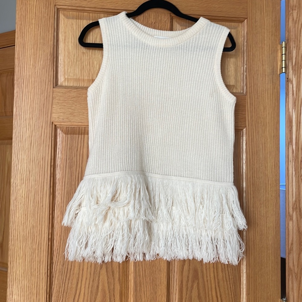 Sleeveless fun and fringe sweater